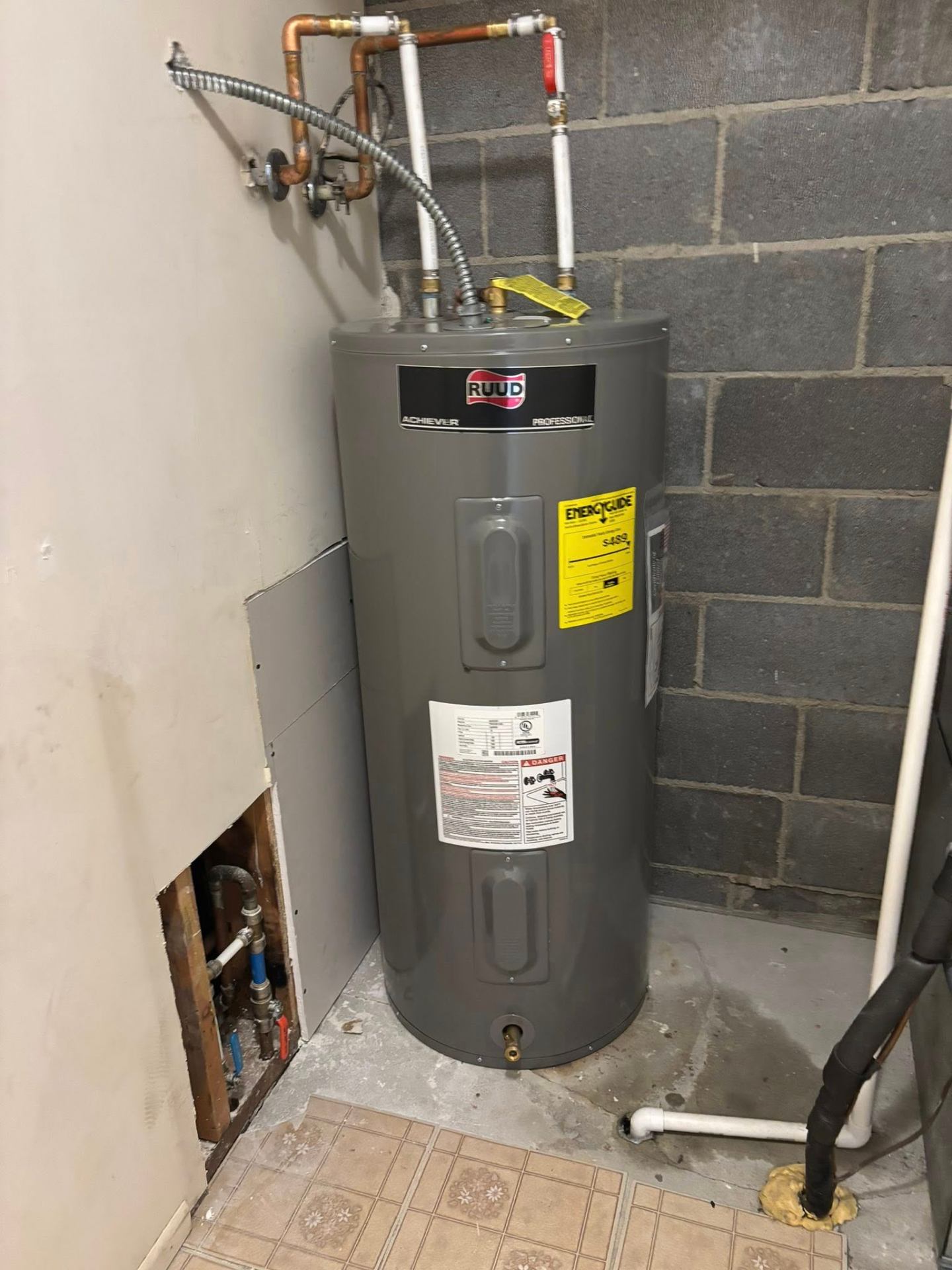 New Ruud electric water heater installation by Golden Plumbing